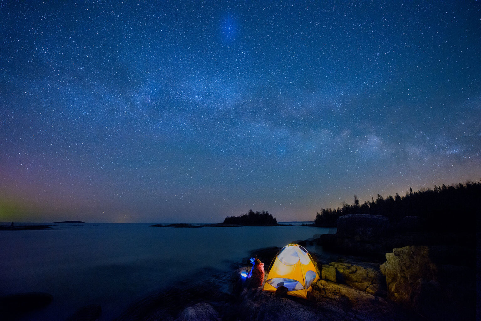 Camping under the dark night sky